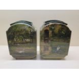 A pair of decorated vases with swans on a river, initialled PM, 20cm tall, very minor chipping but