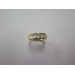 A 750 yellow gold five stone square cut diamond, size L/M, approx 5.2 grams, diamonds bright and