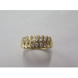 An 850 yellow gold diamond ring, size K, approx 5 grams, signs of re-sizing but diamonds bright