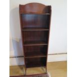 A slim mahogany five tier bookcase, 115cm tall x 38cm x 16cm, stamped R2480, in good condition