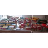 A collection of diecast vehicles including Corgi and Dinky and a boxed Matchbox Fruehauf Hopper