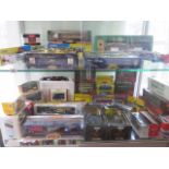 A good selection of boxed diecast vehicles including Dinky, Corgi, Burago, Vanguard and EFE,