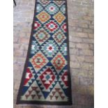 A hand knotted woollen Maimana Kilim runner, 196cm x 65cm