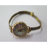 A 9ct yellow gold watch on rolled gold strap, not working, total weight approx 20 grams