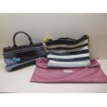 A Radley stripped hand bag, 36cm wide, with dust cover and a Radley fabric handbag, both generally