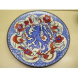 A 19th century early 20th century Wardle Pottery dish, well decorated with a lion and roses