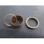 An 18ct yellow gold band ring, size P, approx 4 grams, and 2 x 9ct band rings, one cut, approx 4.6