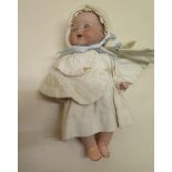 A German Armand Marseille bisque porcelain headed doll 51/3/OK, 22cm tall, reasonably good