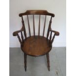 A circa 1900's Penny seat stick back armchair on turned tapering legs in polished restored condition