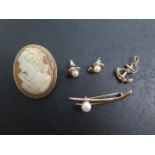 A 9ct gold pearl brooch, a 9ct mounted cameo brooch and a 9ct anchor pendant and a pair of 9ct pearl