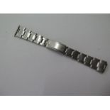A Rolex stainless steel strap, 15cm long with 2 notches of adjustment, general usage marks