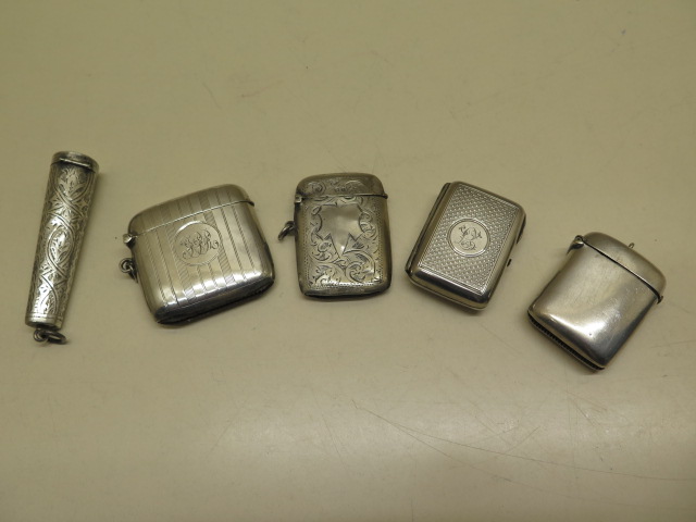 3 silver vestas, a silver match case and a silver cheroot holder, total weight approx 3.7 troy oz