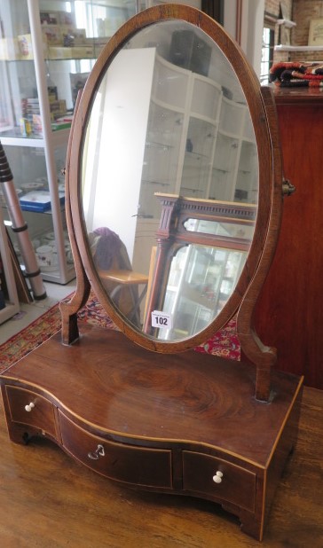 A mahogany serpentine fronted 3 drawer dressing mirror, 59cm tall x 40cm x 20xm