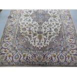 A hand knotted woollen fine Kashan rug, 2.10cm x 1.48cm, generally good, some wear to fringes