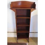 An Edwardian mahogany bookcase with over hanging gallery top, 122cm tall x 61cm x 19cm