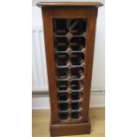 An oak 16 bottle Slim Jim wine rack made by a local craftsman to a high standard, 96cm tall x 33cm x