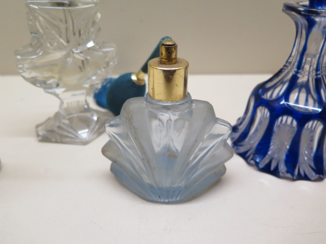 A collection of perfume bottles, blue bottle stopper stuck, chips to base others reasonably good - Image 2 of 2