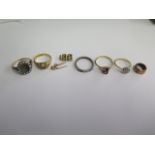 An 18ct yellow gold ring missing a stone, approx 5 grams, 3 other yellow gold rings either broken or