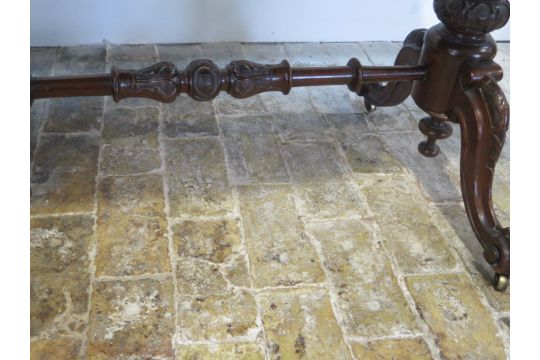 A Victorian burr walnut stretcher table with a shaped top on carved supports united by a - Image 4 of 4