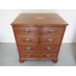 A mahogany 4 drawer chest of small proportions, the top 2 drawers with double moulding, 72cm tall