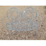 A metal work ornate bench, 94cm tall x 121cm wide