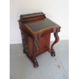 A Victorian walnut Davenport desk with 4 active drawers, brass galleried correspondence top and