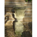A classical stone effect garden urn on stand, 95cm tall x 40cm diameter