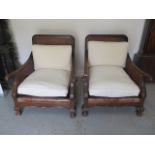 A pair of good beechwood carved bergere caned library club chairs, 89cm tall x 81cm wide x 83cm