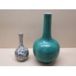 A Chinese Fukien vase over decorated with a turquoise mottled glaze together with a blue and white