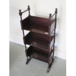 A mahogany three tier bookcase with turned columns, 78cm tall x 35cm x 18cm, in good condition