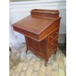 A Victorian mahogany Davenport with 4 active drawers and correspondence compartment, brought in 1990