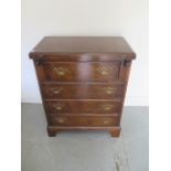 A 19th century style walnut 4 drawer bachelors chest with foldover table top, 77cm tall x 62cm x