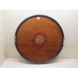 A 19th century mahogany round tray, 57cm, with inlay