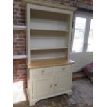 A Neptune Chichester kitchen dresser with an adjustable shelf top above two drawers and two cupboard