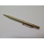 A 9ct yellow gold hallmarked propelling pencil, 12cm long, approx 23.9 grams, small dents but no