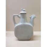 A Chinese celadon decorated water pot and cover in the shape of a bird, 19cm tall, good condition