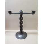 A pewter and oak barley twist candle stick, the base stamped Tudric 01301, 34cm tall