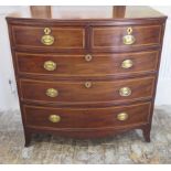 A Georgian mahogany bow fronted chest with 2 short drawers over 3 long drawers on splayed bracket