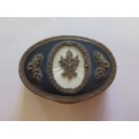 A Continental silver and enamel oval box with a hinged lid, 7cm x 5cm x 1.7cm approx 3 troy oz,