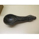 A Chinese antique hard stone nephite jade scoop with a carved horse head handle, archaic script to