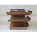 A Mallod three tier bent wood desk tidy, 36cm tall x 38cm x 29cm, some usage marks but generally