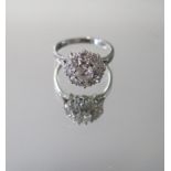 A hallmarked vintage 18ct white gold diamond cluster ring, approx 1.65ct, ring size N, approx 4.7