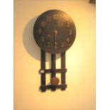 An Arts and Craft 1900's American wall clock, 78cm tall, in running order striking on a gong