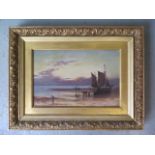 An oil on canvas, fishing boats on a shore, intialled AH 91, in a gilt frame, frame size 35cm x