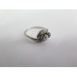 An 18ct white gold and platinum sapphire and diamond ring, size O/P, approx 3.4 grams, some