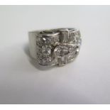 A platinum and diamond Art Deco cocktail ring set with diamonds dating to 1920's / 30's to wear on