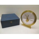 A Jaegar-le-Coultre gilt circular desk clock, 16.5cm tall, manual wind, not currently working,