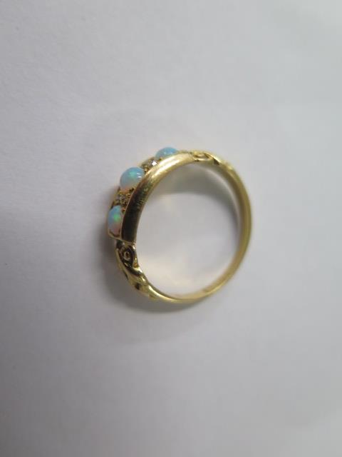 An 18ct yellow gold opal ring, size O, approx 3.2 grams, generally good - Image 2 of 2