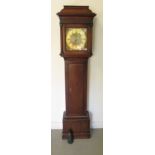 A late 18th century oak 30 hour longcase clock with a 11 inch brass dial signed William Bunch,