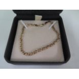 A hallmarked 9ct yellow gold bracelet, 21cm long, approx 4 grams